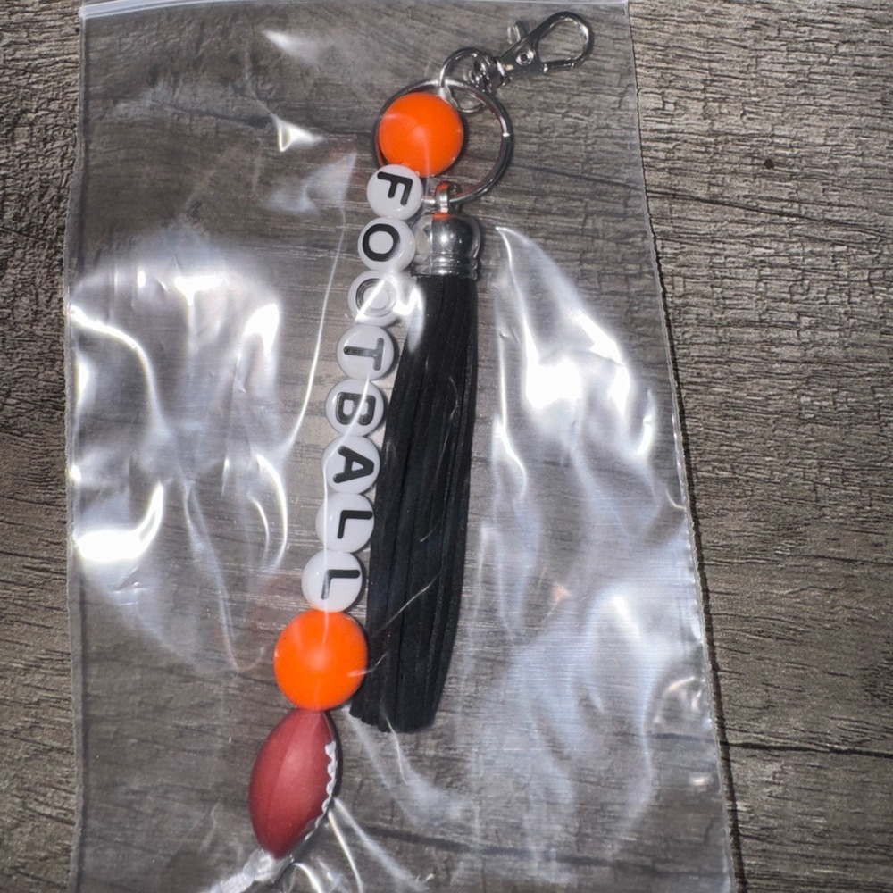 2 keychains   Football Keychain with Black Tassel and Orange Beads